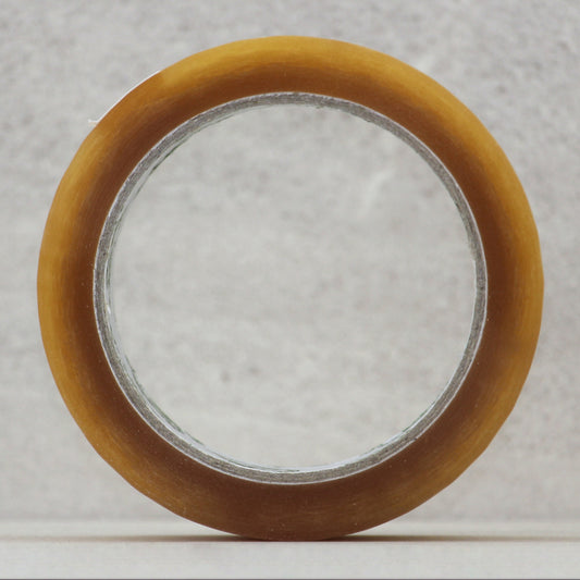 Clear natural rubber packaging tape roll