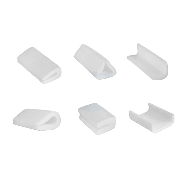 Set of six white plastic corner protectors on a white background Set of six white plastic corner protectors on a white background