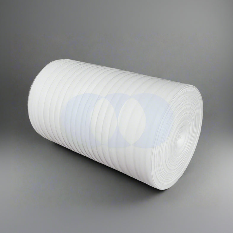 A rolled up white EPE foam sheet against a gray background. A rolled up white EPE foam sheet against a gray background.