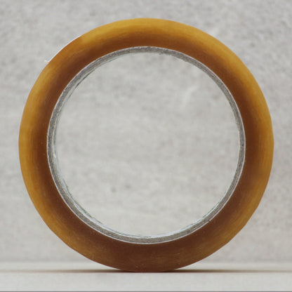 Clear natural rubber packaging tape roll