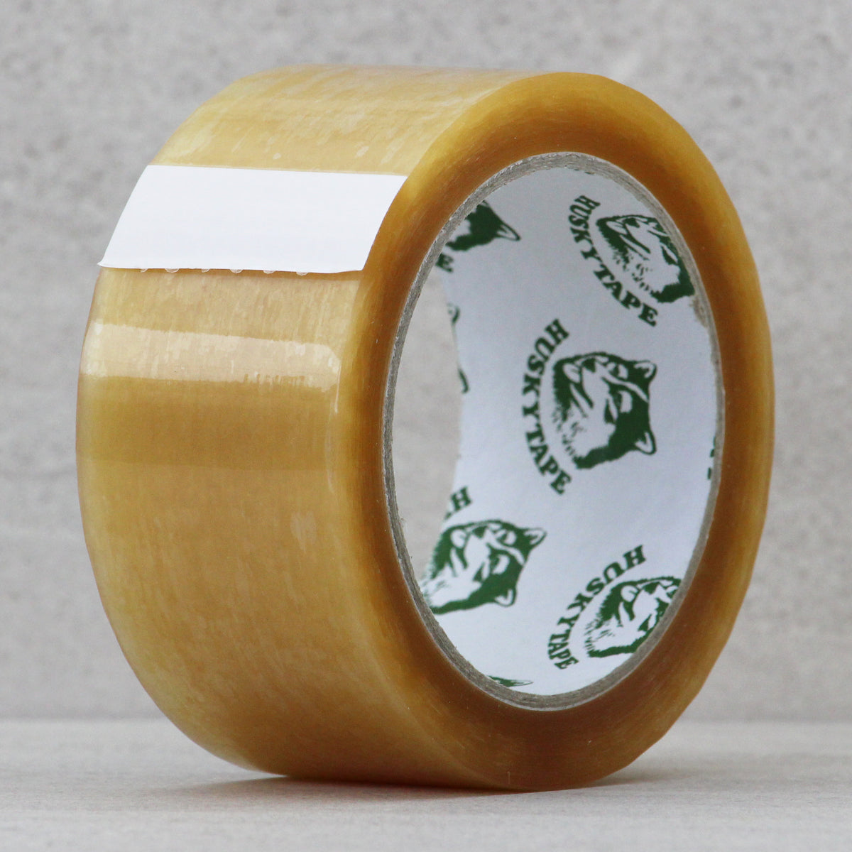 Clear natural rubber packaging tape roll