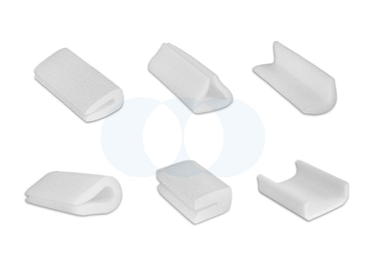Set of six white plastic corner protectors on a white background