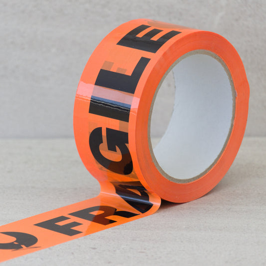 Orange and black Fragile tape partially unrolled